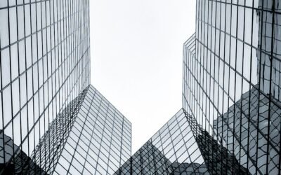 Glass corporate office building representing public companies with Bitcoin treasuries
