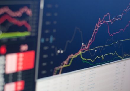 Trading monitor displaying market graph representing new altcoin ETF launches