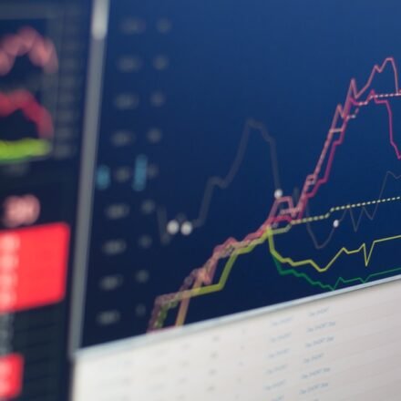 Trading monitor displaying market graph representing new altcoin ETF launches